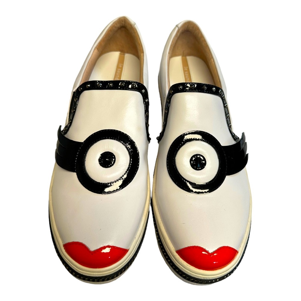 White Leather Slip-On Sneakers with Black Trim and Red Accent
